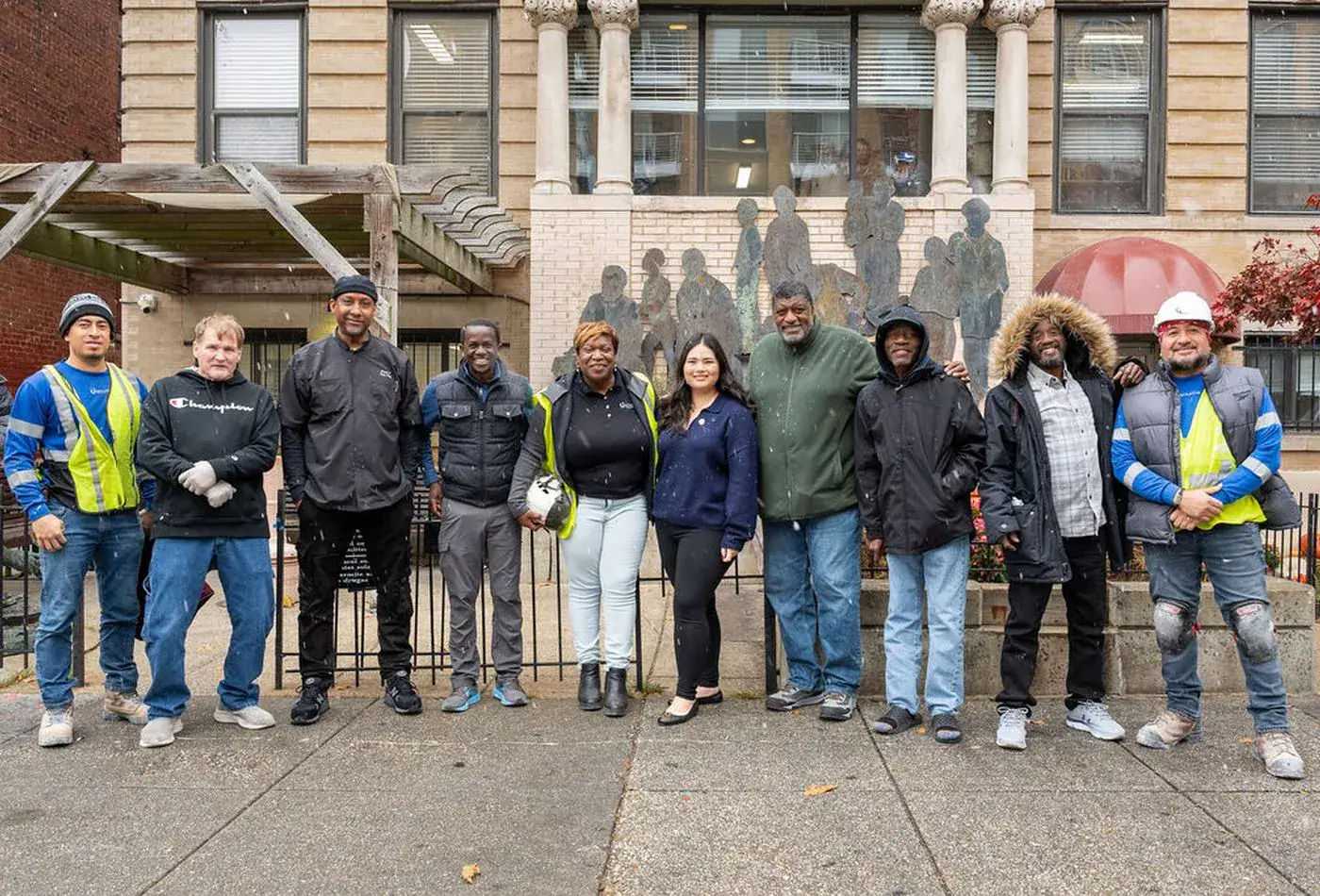 The Usource Construction crew outside a project site