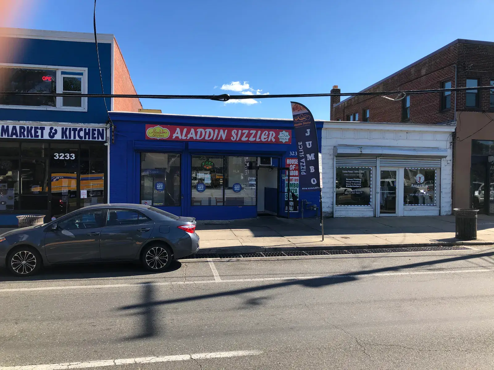 Market and Kitchen and Aladdin Sizzler storefronts before improvements