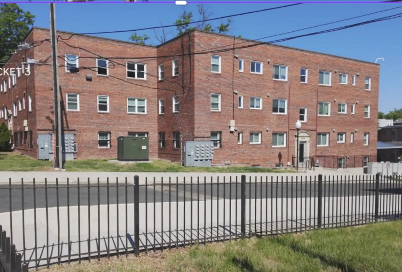 Apartment building exterior before renovation