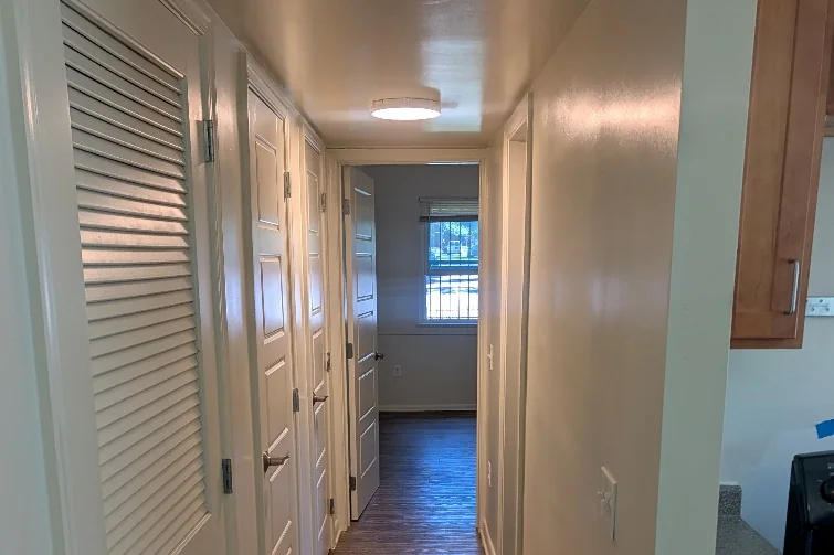 Corridor and unit doors with new flooring