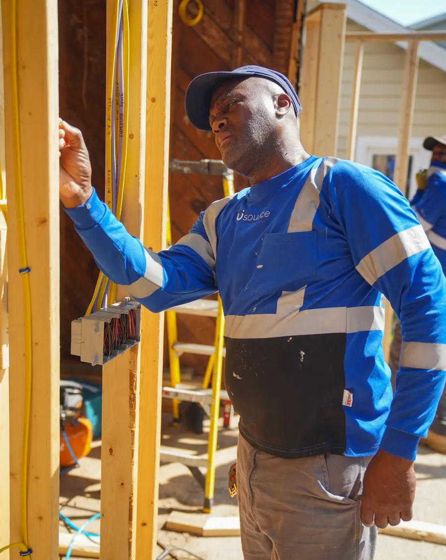 Usource carpenters setting framing